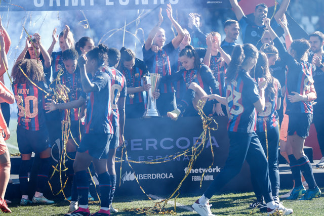 Players of FC Barcelona celebrate the victory with the winners trophy during the Spanish Women Supercup, Final, football match played between Real Sociedad and FC Barcelona at Estadio Romano Jose Fouto on january 22, 2023, in Merida, Spain.
