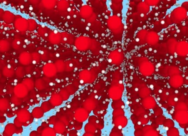 Imagen de la simulación del hielo XVIII. Los iones de oxígeno (rojo) ocupan una red cristalina regular, mientras que los protones (blanco) se difunden como un líquido.