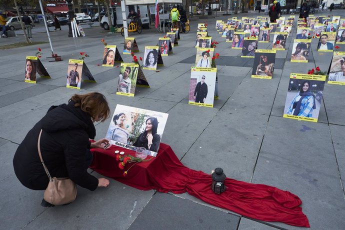 Archivo - December 2, 2022, Paris, France: Photographs of men and women killed during recent protests in Iran against the Islamist regime are laid out on the Place de la Republique in Paris, France. The protests in Iran follow the death of Masha Amini, 