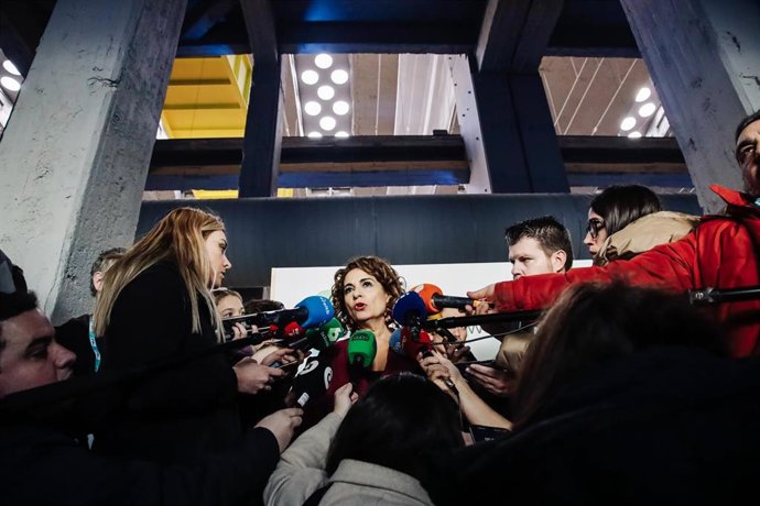 La ministra de Hacienda y Función Pública, María Jesús Montero, atiende a medios a su llegada a la presentación de Future: Fast Forward, agrupación empresarial del sector de la automoción, en el Espacio La Nave, a 2 de febrero de 2023, en Madrid (Espa