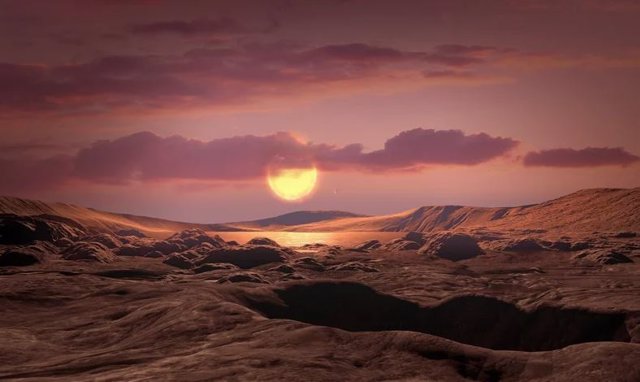 Concepción artística de un exoplaneta rocoso de masa terrestre como Wolf 1069 b en órbita alrededor de una estrella enana roja.