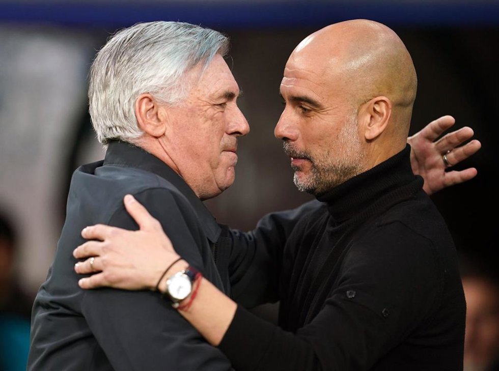 Archivo - Carlo Ancelotti, entrenador del Real Madrid y Pep Guardiola, técnico del Manchester City.