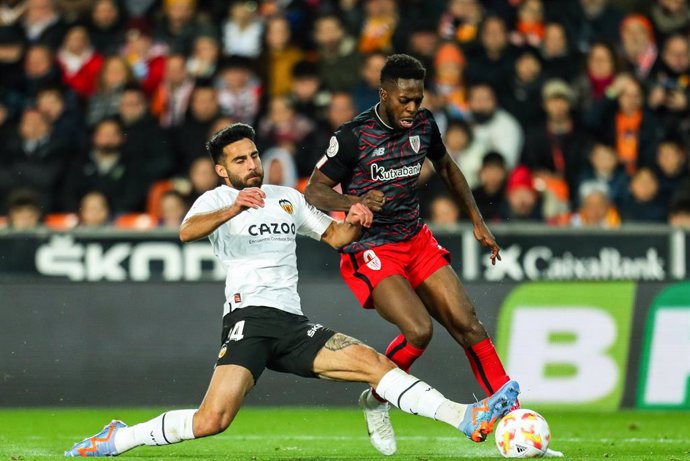 Inaki Williams of Athletic and Eray Comert of Valencia in action during the spanish cup, Copa del Rey, football match played between Valencia and Athletic Club de Bilbao at Estadium Mestalla on January 26, 2023, in Valencia, Spain.