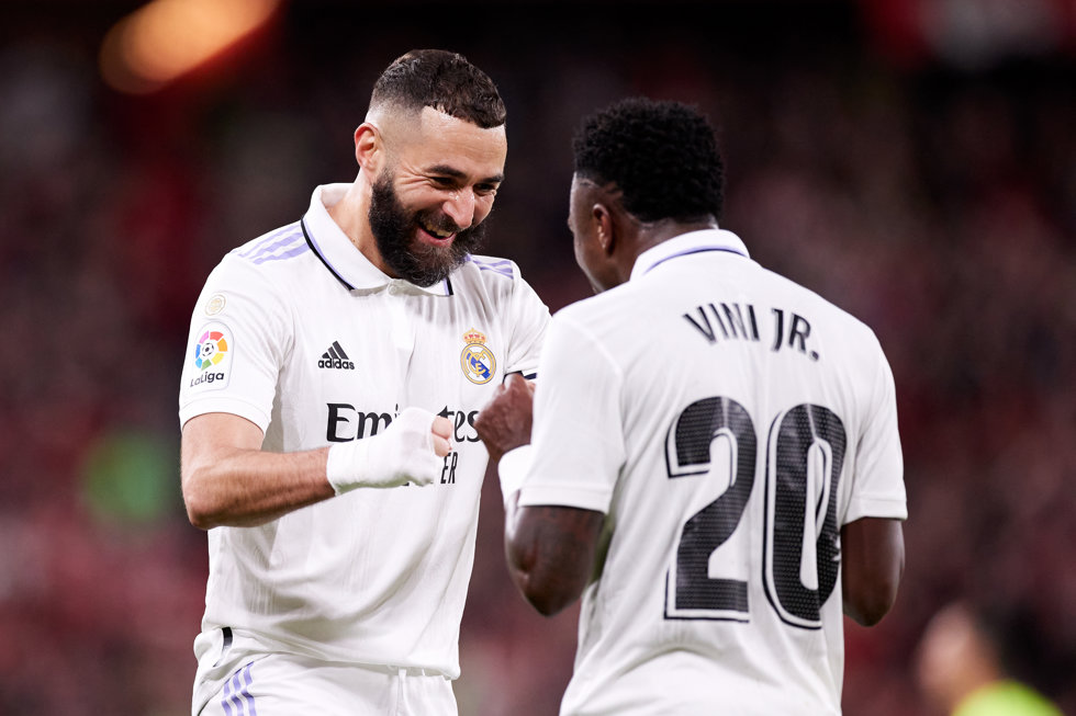 Karim Benzema of Real Madrid CF celebrates with Vinicius Junior after scoring goal during the La Liga Santander match between Athletic Club and Real Madrid CF at San Mames on January 22, 2023, in Bilbao, Spain.