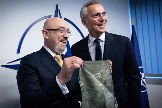 HANDOUT - 14 February 2023, Belgium, Brussels: NATO Secretary General Jens Stoltenberg (R) receives Ukraine's Defence Minister Oleksii Reznikov ahead of their meeting, on the sideline of the NATO Defence Ministers meeting. Photo: -/NATO/dpa - ATTENTION: