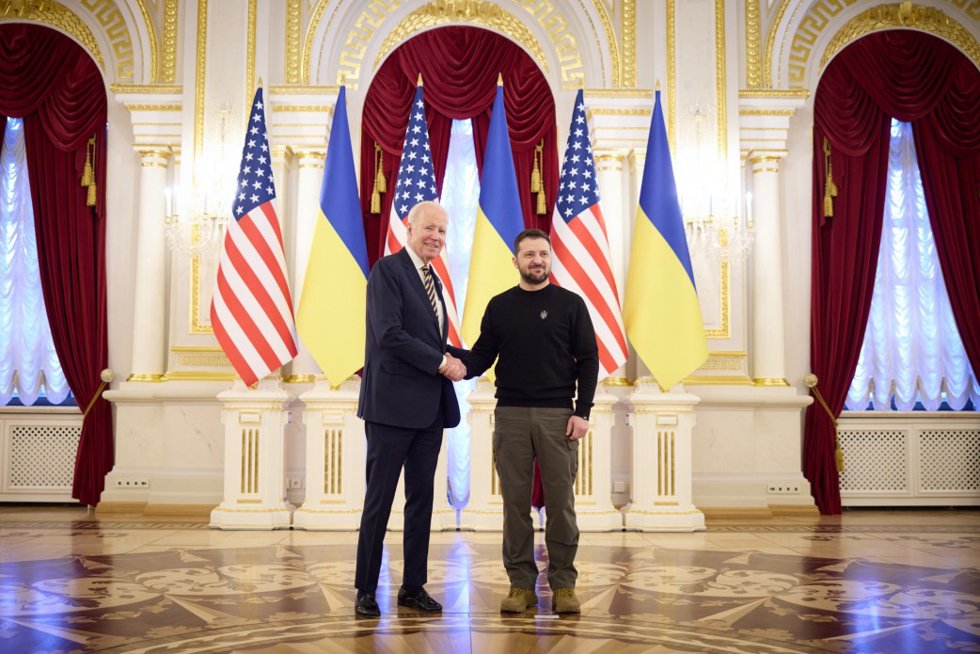 HANDOUT - 20 February 2023, Ukraine, Kiev: Ukrainian President Volodymyr Zelensky (R) receives US President Joe Biden at the Presidential Palace