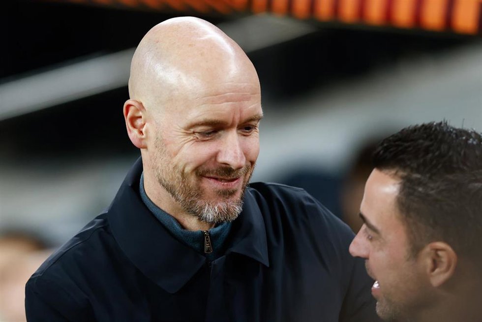 Erik Ten Hag, head coach of Manchester United, saludates to Xavi Hernandez, head coach of FC Barcelona, during the UEFA Europa League, knockout round play-off, football match played between FC Barcelona and Manchester United at Spotify Camp Nou