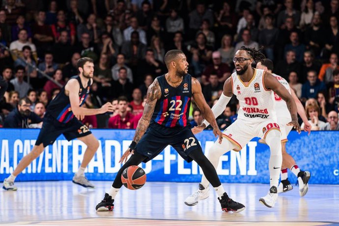 Cory Higgins of FC Barcelona in action against John Brown of AS Monaco during the Turkish Airlines EuroLeague match between FC Barcelona and AS Monaco at Palau Blaugrana on February 24, 2023 in Barcelona, Spain.