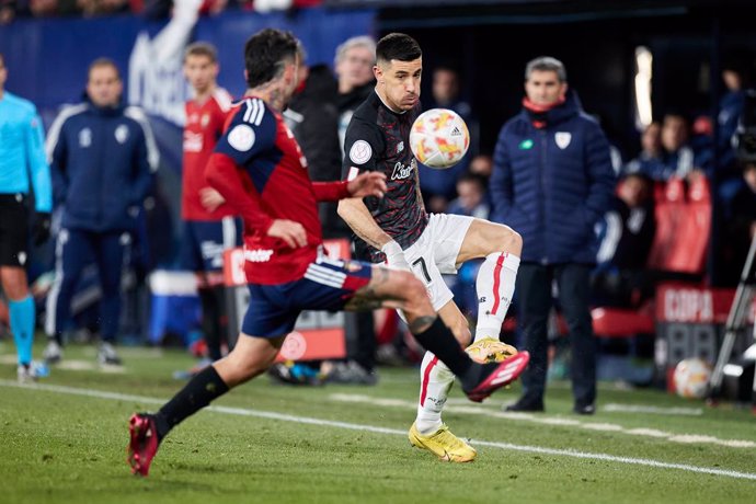 Yuri Berchiche of Athletic Club competes for the ball with Ruben Garcia of CA Osasuna during the Copa del Rey match between CA Osasuna and Athletic Club at El Sadar  on March 1, 2023, in Pamplona, Spain.