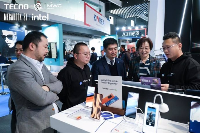 Mar 1st, 2023. The Vice President of Transsion Holdings Ha Le (The man on left) meets Senior VP and Chair of INTEL China Wang Rui( The lady at second right) at TECNO booth, MWC 2023 Barcelona.