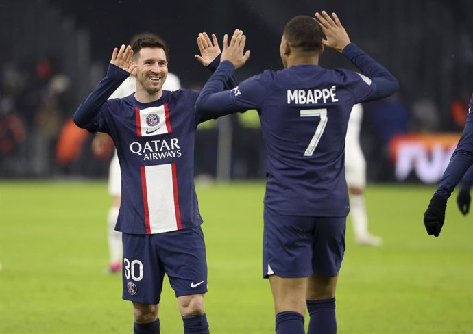 Kylian Mbappe of PSG celebrates his second goal with Lionel Messi (left) during the French championship Ligue 1 football match between Olympique de Marseille (OM) and Paris Saint-Germain (PSG) on February 26, 2023 at Stade Velodrome in Marseille, France