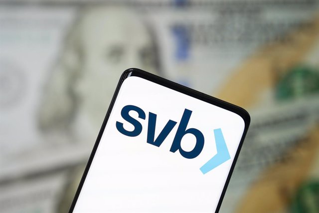 13 March 2023, China, ---: A view of a smartphone screen with the Silicon Valley Bank (SVB) logo. Photo: Sheldon Cooper/SOPA Images via ZUMA Press Wire/dpa