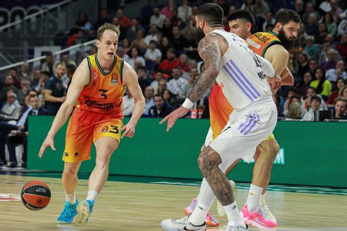 Klemen Prepelic of Valencia Basket, Vicent Poirier of Real Madrid, Jaime Pradilla of Valencia Basket and Gabriel Deck of Real Madrid in action during Turkish Airlines Euroleague basketball match between Real Madrid and Valencia Basket at Wizink Center