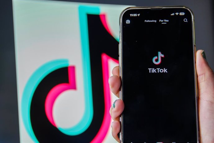 March 16, 2023, United Kingdom: In this photo illustration, a Tik Tok logo seen on a smartphone. Cabinet Office minister Oliver Dowden will later today announce a ban on the Chinese social media app Tik Tok on all devices for its government ministers an