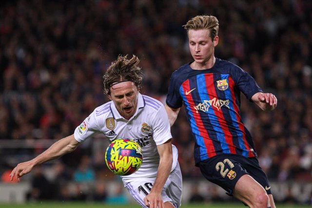 Luka Modric of Real Madrid and Frenkie de Jong of FC Barcelona in action during the spanish league, La Liga Santander, football match played between FC Barcelona and Real Madrid at Camp Nou stadium on March 19, 2023, in Barcelona, Spain.