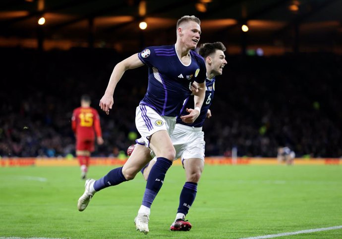 28 March 2023, United Kingdom, Glasgow: Scotland's Scott McTominay celebrates scoring his side's second goal during the UEFA Euro 2024 qualifying group A soccer match between Scotland and Spain at Hampden Park. Photo: Steve Welsh/PA Wire/dpa
