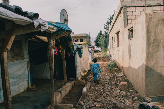 December 3, 2021, Bekaa, Lebanon: Boy is going to his friend, who lives outside the camp. A morning in a refugee camp in the Bekaa Valley, around 20 families live. Some families have been waiting for five years to go to another place. Even if the situat