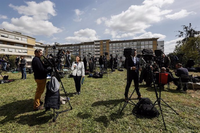 March 30, 2023, ROME, ITALY: Journalists gather outside the Agostino Gemelli Hospital where the Pope was hospitalized the previous day, in Rome, Italy, 30 March 2023. Pope Francis was hospitalized on 29 March following a respiratory infection (excluding