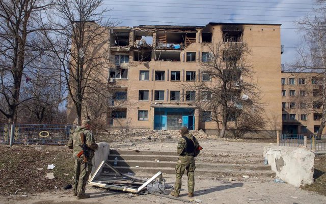 December 22, 2022, Kyiv Region, Ukraine: Soldiers next to a dormitory destroyed by a Russian nighttime drone attack, Rzhyshchiv, Kyiv Region, central Ukraine.