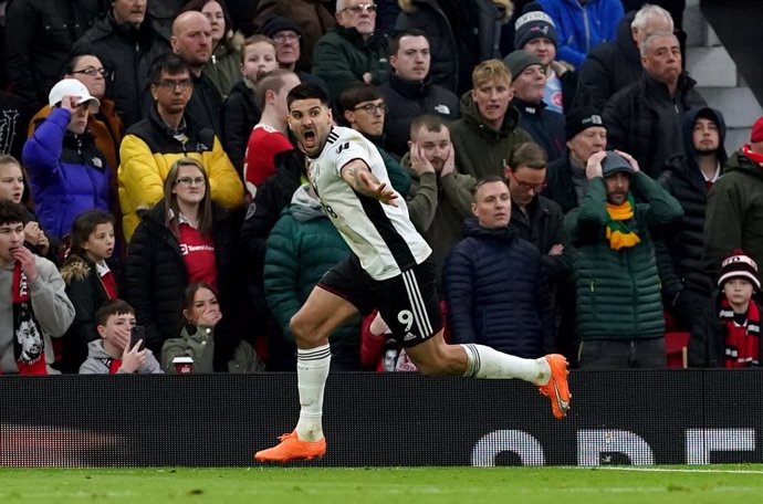 19 March 2023, United Kingdom, Manchester: Fulham's Aleksandar Mitrovic celebrates scoring his side's first goal during the English FA Cup quarter-final soccer match between Manchester United and Fulham at Old Trafford. Photo: Martin Rickett/PA Wire/dpa