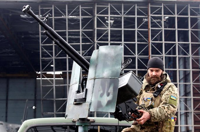 April 1, 2023, Hostomel, Kyiv Region, Ukraine: A serviceman stands behind a machine gun mounted on one of the 10 Ford F250 and F350 four-wheel drive pickup trucks to be conveyed from the HEROCAR Project to Ukraine's Armed Forces under the Guardians of t