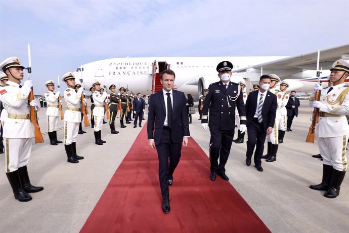 BEIJING, April 5, 2023  -- French President Emmanuel Macron arrives at Beijing Capital International Airport in Beijing, capital of China, April 5, 2023. At the invitation of Chinese President Xi Jinping, French President Emmanuel Macron arrived in Beij
