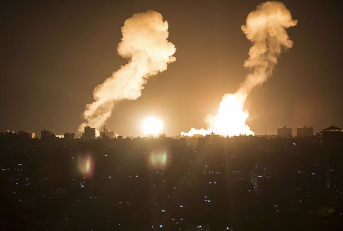 GAZA, April 7, 2023  -- Fire and smoke are seen following an Israeli airstrike in the southern Gaza Strip city of Khan Younis on April 7, 2023. Israel on Friday intensified airstrikes on military posts in the Gaza Strip and Lebanon, in response to rocke