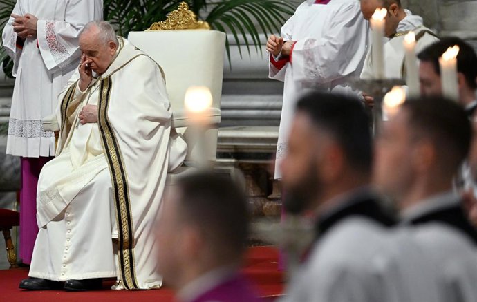 April 6, 2023, VATICAN CITY: Pope Francis (L) during the Mass of the Chrism at the Saint Peter's Basilica in the Vatican City, 06 April 2023. During the mass the Pope blesses Chrism oil which is used for the religious sacraments during this year. The Ch