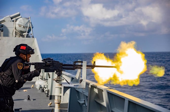 QINGDAO, March 31, 2023  -- A soldier shoots during an actual combat training of the 42nd fleet of the Chinese People's Liberation Army Navy, on Jan. 31, 2023. A Chinese naval fleet returned to east China's port city of Qingdao in Shandong Province on T