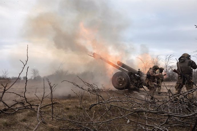 March 21, 2023, Bakhmut, Donetsk Region, Ukraine: Artillerymen from the 24th assault battalion ''Aidar'' shooting from 122 mm howitzer D-30 into Russian positions near Bakhmut, Donetsk region, Ukraine. Ukrainian forces heroically hold positions and atta