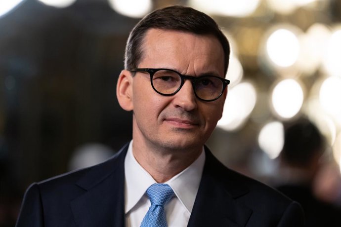 April 11, 2023, Washington, District of Columbia, USA: Prime Minister Mateusz Morawiecki of Poland listens as United States Vice President Kamala Harris gives remarks to the press prior to their meeting in the Vice President's Ceremonial Office in the E