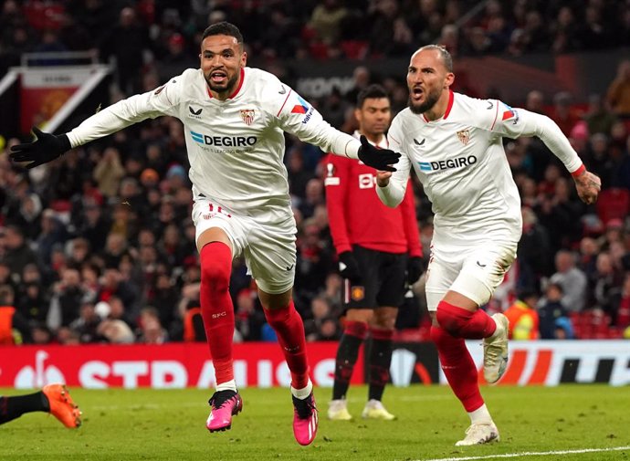 13 April 2023, United Kingdom, Manchester: Sevilla's Youssef En-Nesyri celebrates their side's second goal of the game, an own goal scored by Manchester United's Harry Maguire during the UEFA Europa League quarter-final first leg soccer match between Ma