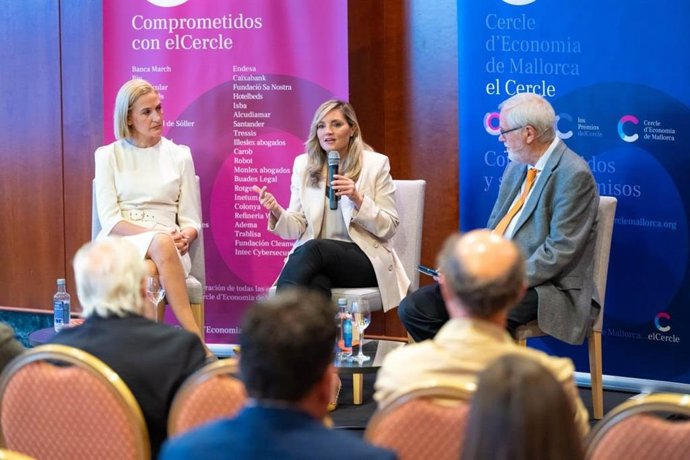 Guasp y Pomar, durante el coloquio.