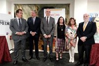 Sevilla celebra el medio siglo del traslado de la Feria con un libro, música, mupis y maquetas de la portada