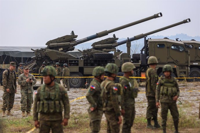 April 14, 2023, New Clark City, New Clark City, The Philippines: Filipino Army soldiers prepare to set up the weapons as self-propelled artillery vehicles are deployed during a combined field artillery live fire exercise as part of the US-Philippines Ba
