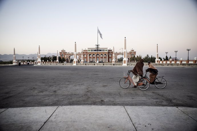 November 15, 2021, Kandahar, Afghanistan: Two men ride bicycles in a park of modern Kandahar. The large Pakistani-influenced Pashtun city has doubled in size in recent years as its leaders have developed a large, formerly deserted area in its eastern pa