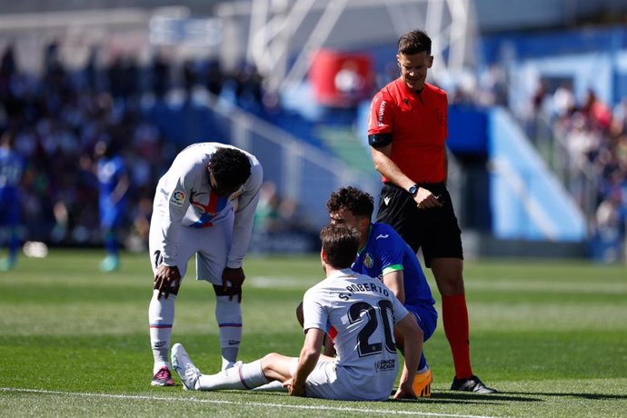 Sergi Roberto of FC Barcelona gets injured during the spanish league, La Liga Santander, football match played between Getafe CF and FC Barcelona at Coliseum Alfonso Perez stadium on April 16, 2023, in Madrid, Spain.