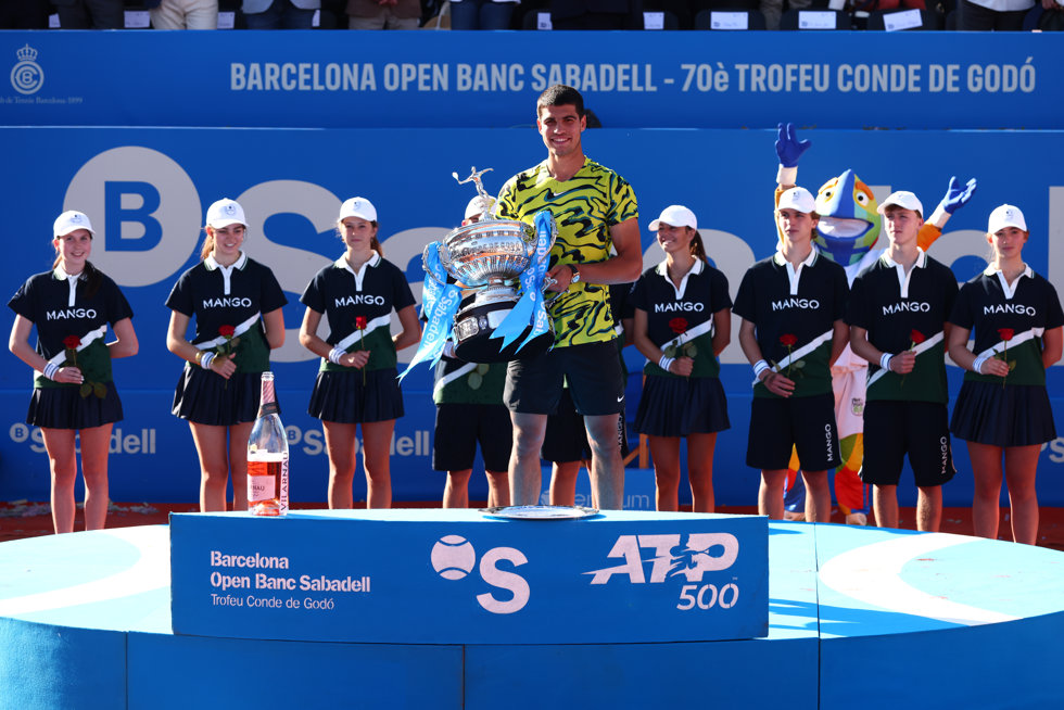 Carlos Alcaraz of Spain poses for photo with the champion trophy after winning against Stefanos Tsitsipas of Greece during the Final match of the Barcelona Open Banc Sabadell 2023