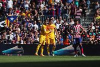 El Barça tumba al Atlético para atar la Liga