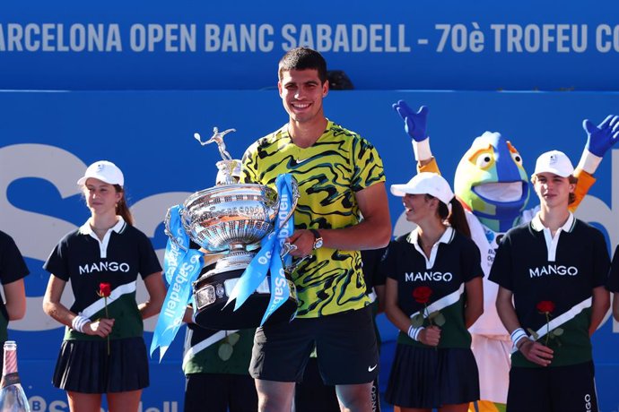 Carlos Alcaraz of Spain poses for photo with the champion trophy after winning against Stefanos Tsitsipas of Greece during the Final match of the Barcelona Open Banc Sabadell 2023 (Conde Godo) at Real Club De Tenis Barcelona on April 23, 2023 in Barcelo