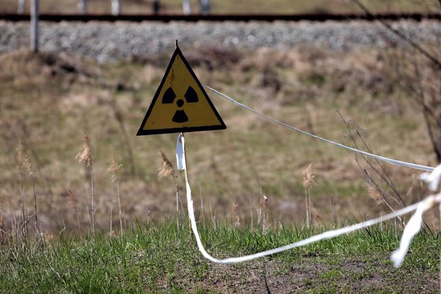 Archivo - April 28, 2022, Kyiv Region, Ukraine: An international ionizing radiation trefoil symbol is pictured in the Chornobyl Exclusion Zone pictured after the withdrawal of Russian troops, Kyiv Region, northern Ukraine.