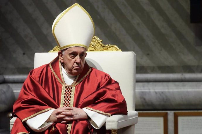 07 April 2023, Vatican, Vatican City: Pope Francis (R) leads the Lord's Passion Mass in St Peter's Basilica on Holy Friday. Photo: Evandro Inetti/ZUMA Press Wire/dpa