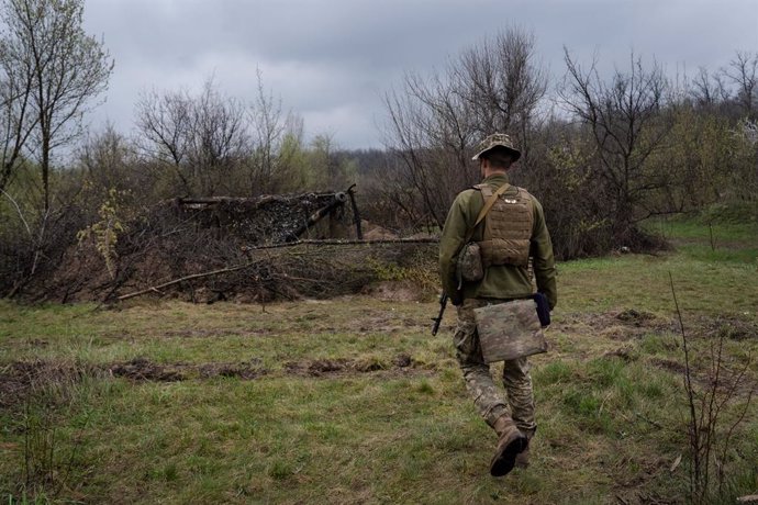 April 15, 2023, Bakhmut, Ukraine: A Ukrainian soldier from the 17th tank brigade is seen walking towards a self-propelled howitzer at Ukrainian position near Bakhmut. Ukrainian armed force is fighting intensely in Bakhmut and the surrounding area as Rus