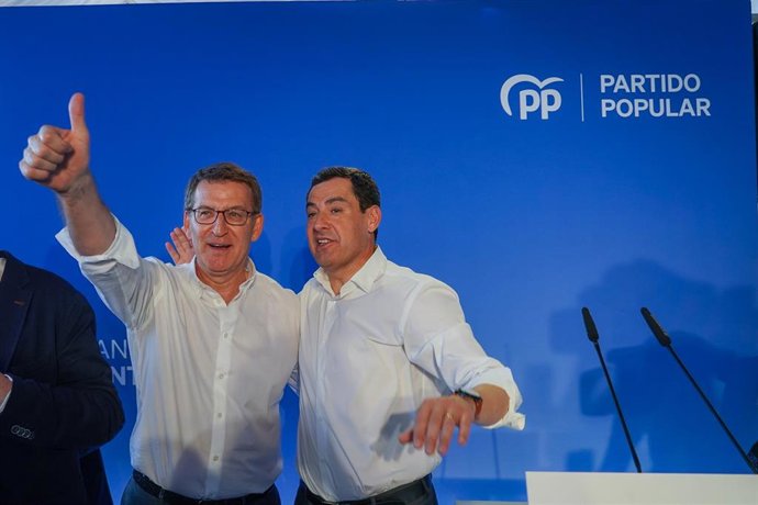 El presidente del PP, Alberto Núñez Feijóo y el presidente del PP-A, Juanma Moreno, en imagen de archivo.