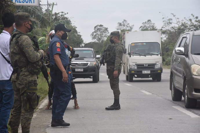 Archivo - February 10, 2022, Leganes, Iloilo, Philippines: PNP/ARMY tightens checkpoints for election gun ban. Election period begins: Comelec imposes checkpoints, gun ban. Joint military and police forces conduct Commission on Elections checkpoints. Thur