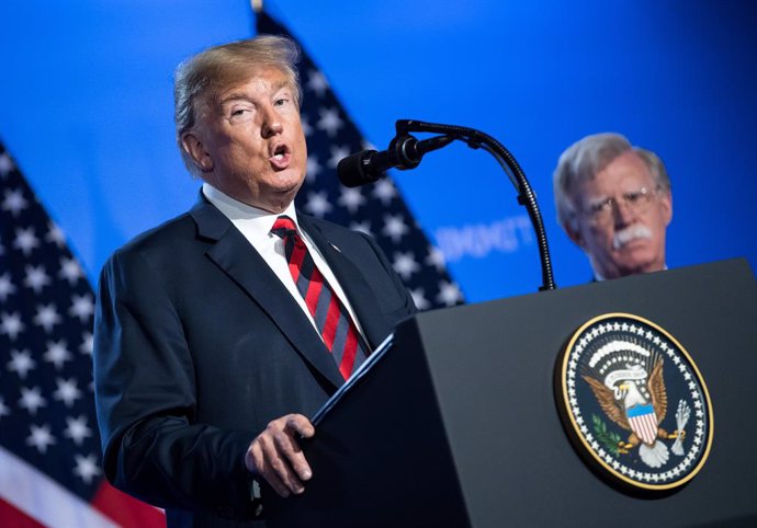 Archivo - FILED - 12 July 2018, Belgium, Brussels: US President Donald Trump (R) and then Security Advisor of US President John Bolton hold a press conference at the end of the NATO summit. Trump said he has asked Bolton to resign, citing Tuesday strong
