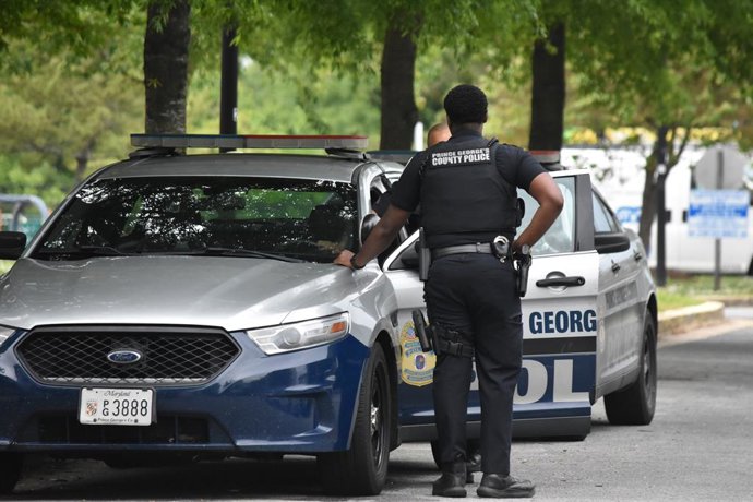 May 13, 2023, District Heights, Maryland, United States: Prince George's County Police Department Officers converse with each other at the scene of the crime. At approximately 11:50 am Eastern Time, Saturday, May 13, 2023 Prince George's County Police D