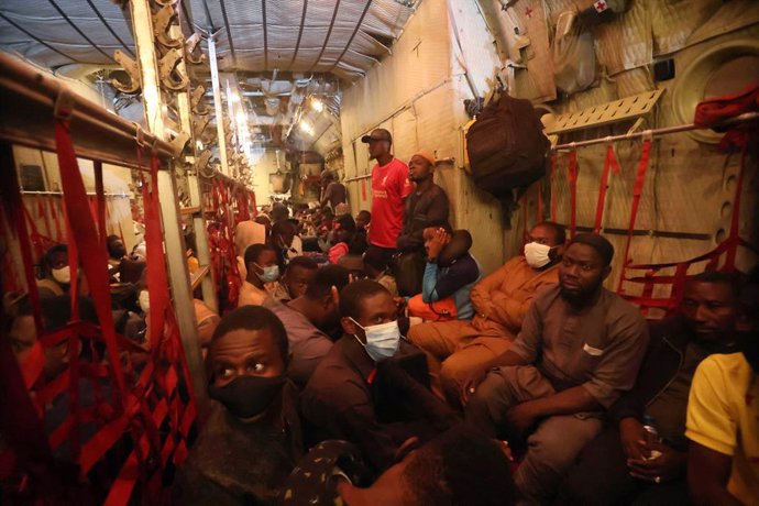 ABUJA, May 4, 2023  -- This photo taken on May 4, 2023 shows people in a Nigerian air force plane used to evacuate Nigerians from Sudan arriving in Abuja, Nigeria.   The first batch of Nigerians who were stranded in Sudan arrived in the capital Abuja la