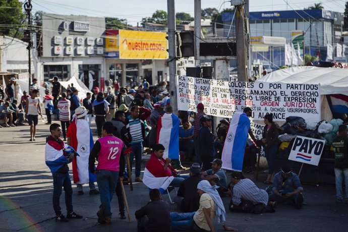May 11, 2023, Asuncion, Paraguay: People gather during a demonstration against the alleged electoral fraud in the recent general elections held on April 30, in the vicinity of the Superior Court of Electoral Justice (TSJE), in Asuncion, Paraguay.