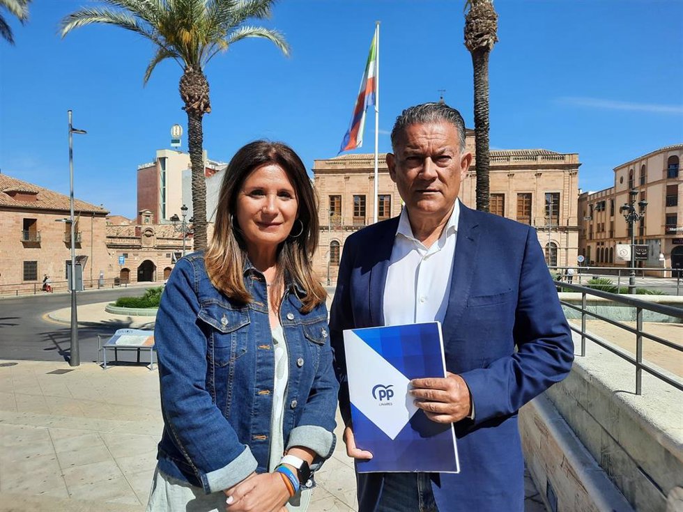 Raul Caro Accino y Auxi del Olmo